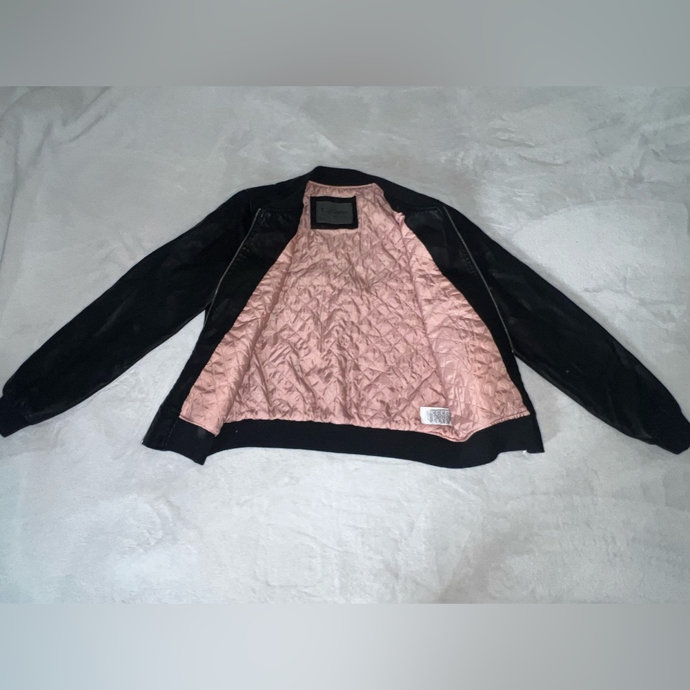 Black leather jacket. Size XL.